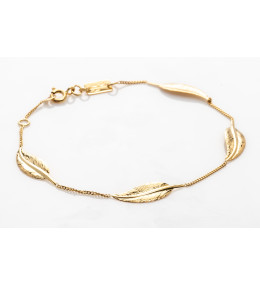 le Bracelet or jaune 375/1000, motifs plumes, by Stauffer