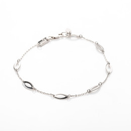 le Bracelet or jaune 375/1000, motifs navettes, by Stauffer