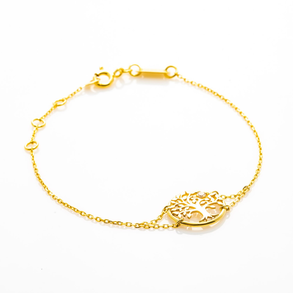 le Bracelet or jaune 375/1000, diamant et motif arbre de vie, by Stauffer