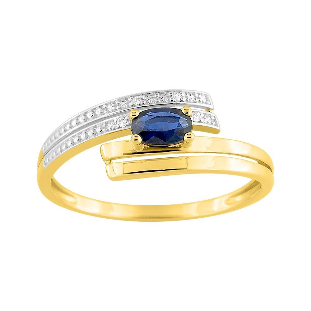 Bague or jaune 375/1000, saphir bleu taille ovale et diamants by Stauffer