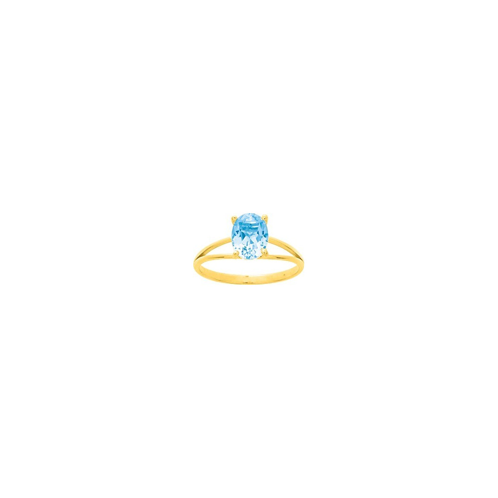 Bague or jaune 375/1000, Topaze bleue traitée, taille ovale by Stauffer