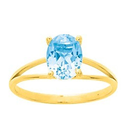 Bague or jaune 375/1000, Topaze bleue traitée, taille ovale by Stauffer