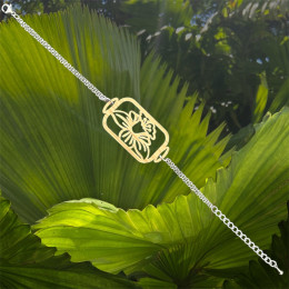 Le Bracelet jonquille en chêne tour découpé et acier by Stauffer "bijou officiel de la fête des jonquilles de Gerardmer"