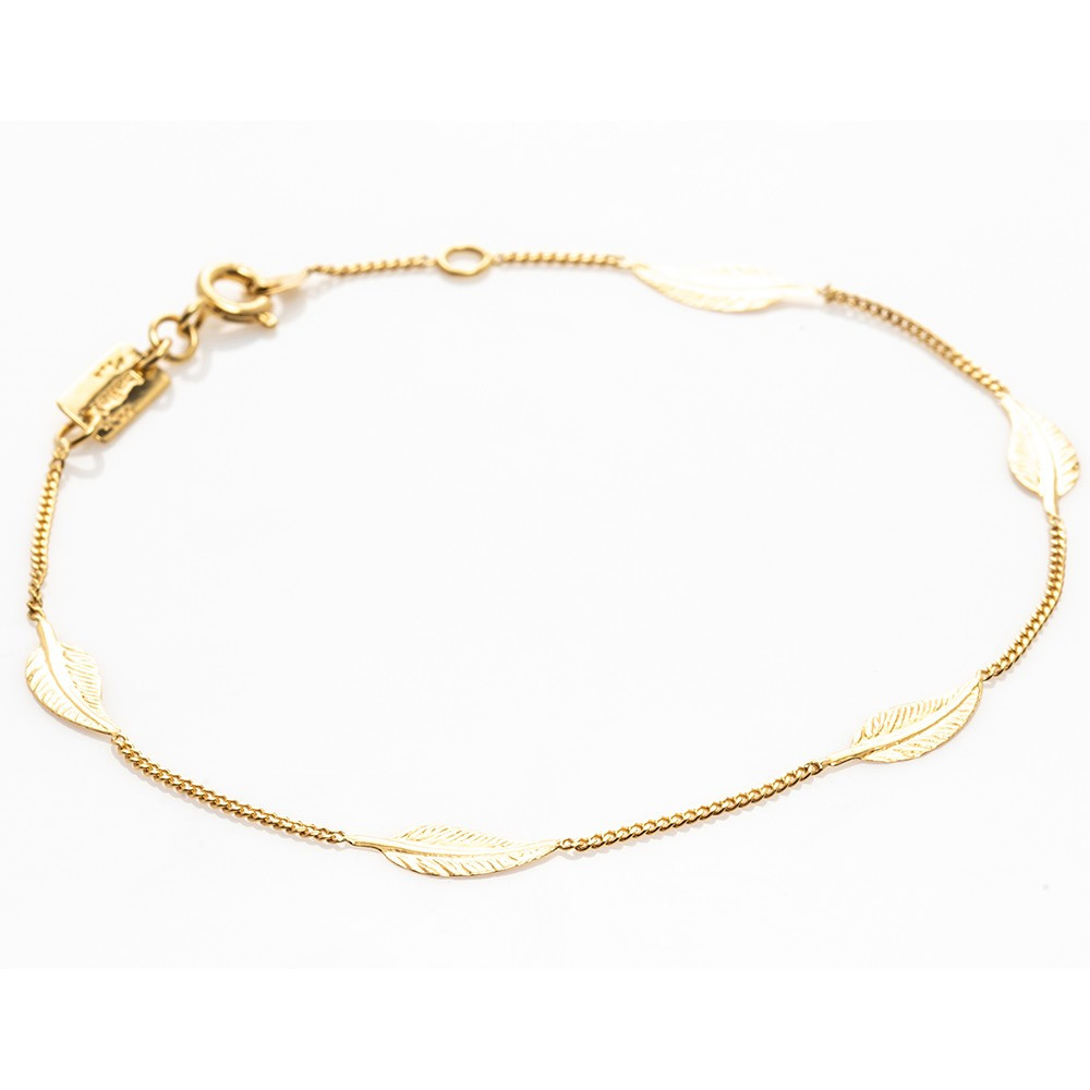 le Bracelet or jaune 375/1000, motifs plumes, by Stauffer