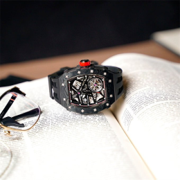 La Montre homme Tsar Bomba Elemental collection, Automatique, acier, carbone noir et bracelet élastomère noire FKM TB8209CF01