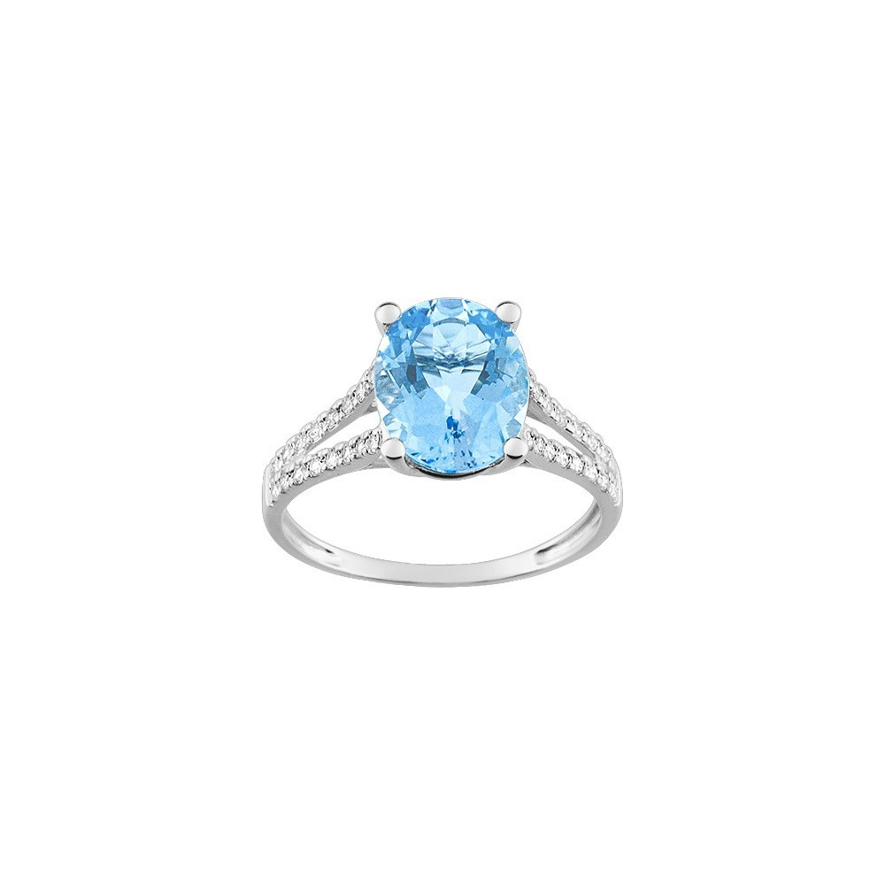 La Bague or gris 375/1000 Topaze bleue traitée taille ovale et oxyde de zirconium by Stauffer
