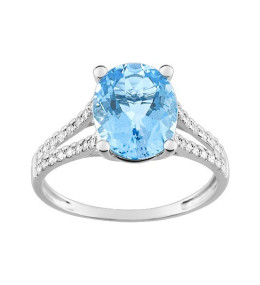 La Bague or gris 375/1000 Topaze bleue traitée taille ovale et oxyde de zirconium by Stauffer