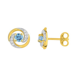 Les Boucles d'oreilles or bicolore 375/1000, topazes bleues by Stauffer