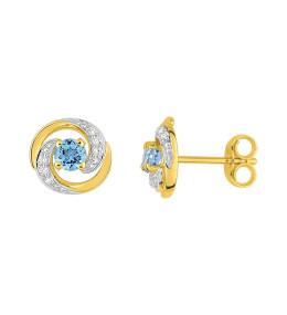 Les Boucles d'oreilles or bicolore 375/1000, topazes bleues by Stauffer