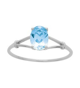 Bague or gris 375/1000, Topaze bleue traitée, taille ovale by Stauffer