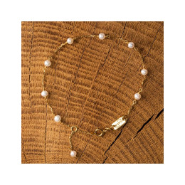 le Bracelet or jaune 375/1000, mailles forçat avec perles de culture de 3,5 à 4 mm, by Stauffer