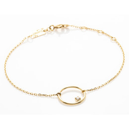 le Bracelet or jaune 375/1000, motif rond avec 1 diamant de 0,03 carat, by Stauffer