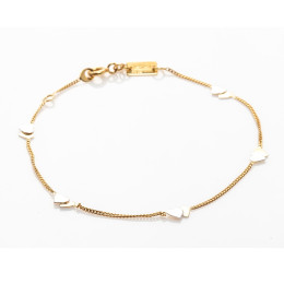 Le Bracelet or jaune 375/1000, motifs coeurs bicolore, by Stauffer
