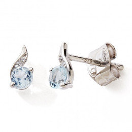 Les Boucles d'oreilles or gris 375/1000, topazes bleues et oxydes de zirconium, by Stauffer