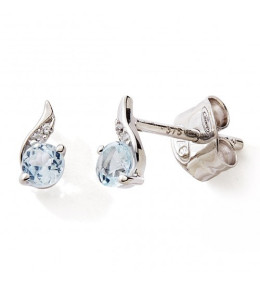 Les Boucles d'oreilles or gris 375/1000, topazes bleues et oxydes de zirconium, by Stauffer