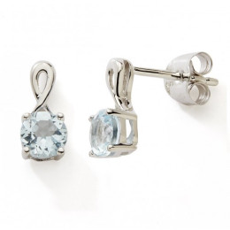 Les Boucles d'oreilles or gris 375/1000, topaze bleue by Stauffer