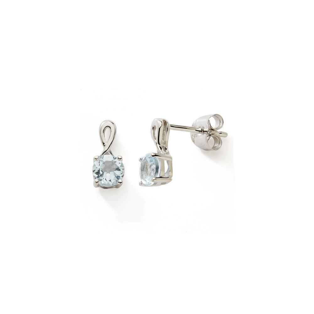 Les Boucles d'oreilles or gris 375/1000, topaze bleue by Stauffer