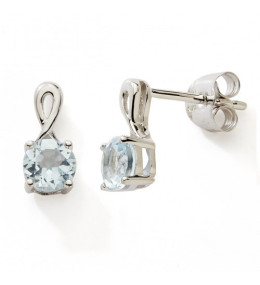 Les Boucles d'oreilles or gris 375/1000, topaze bleue by Stauffer